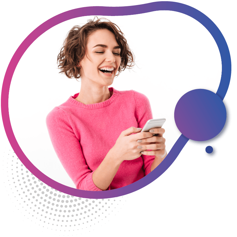 A person in a pink sweater holding a smartphone, focused on their device,  illustrating everyday eSIM usage in Australia.