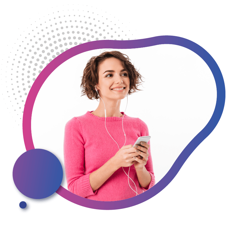 A person in a pink sweater holds a smartphone connected to earphones, , representing modern eSIM connectivity in Australia