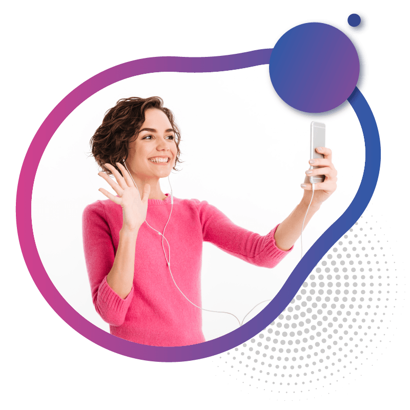 A person in a pink sweater holding a smartphone and waving, with earphones connected, representing the friendly and effortless start to using eSIM in Australia